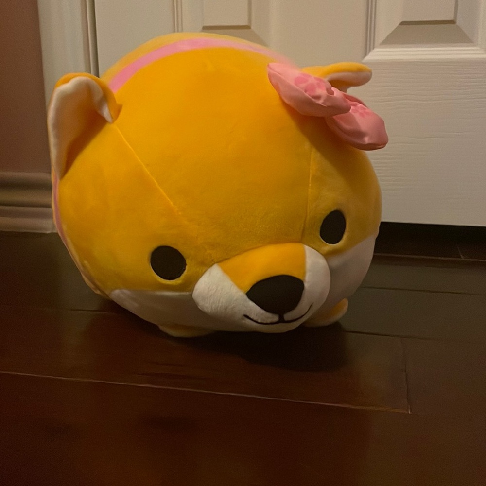 17in long 10in wide yellow plush Shiba Inu.